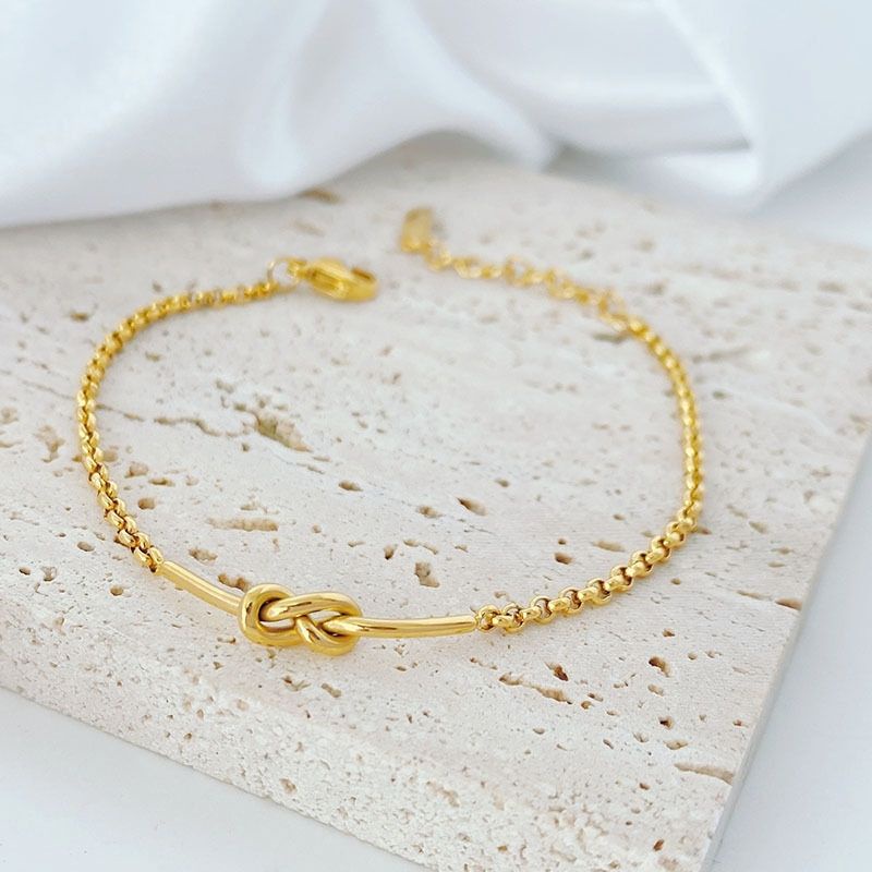 Vòng đeo tay thép titan mạ vàng 18k thắt nút thời trang dành cho nữ
