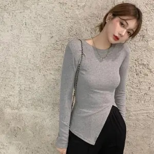 Áo len tăm nữ xẻ vạt, ao thun nữ vạt lệch, áo thu đông xẻ tà lệch dáng ôm.