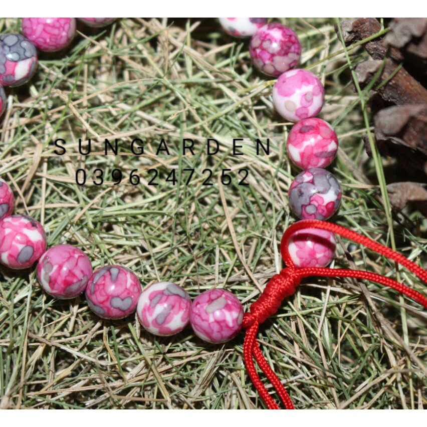 Vòng tay gỗ hóa thạch màu hoa đào 8ly