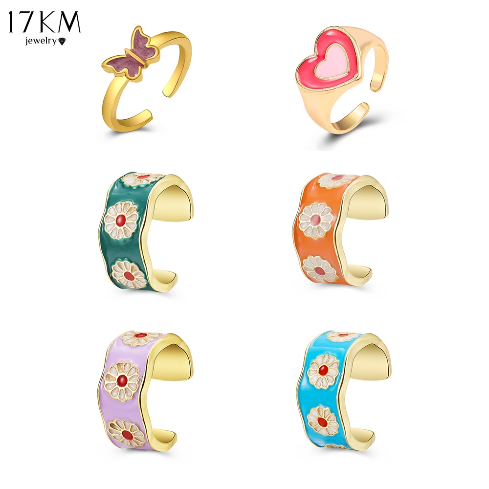 Nhẫn đeo ngón tay 17KM bằng resin hình trái tim hoa bươm bướm nhiều màu sắc Hàn Quốc