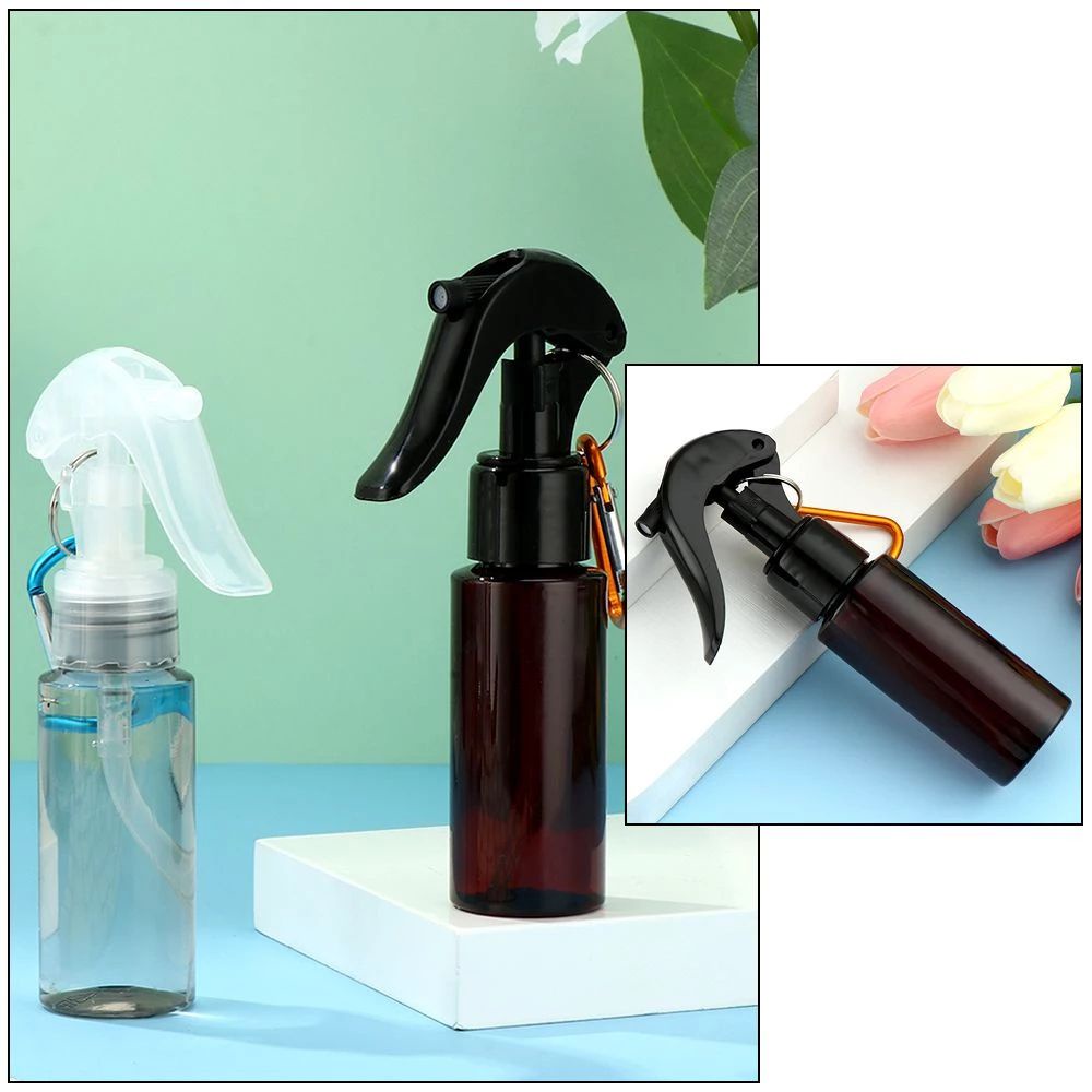 Bình xịt phun sương bằng nhựa trong suốt kèm móc khóa nhỏ gọn tiện dụng mang theo khi đi du lịch