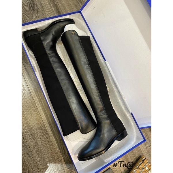Boots nữ cổ cao gối SW đai da pha chun sau đế bệt 2cm Fullbox
