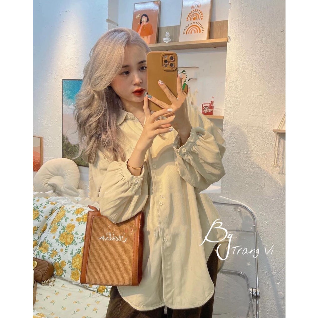 CARINA . Áo sơ mi trắng basic nhưng không bao giờ hết hot, kiểu dáng dài tay bó ống,Màu Nâu và màu BE.