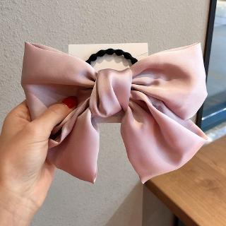 Kẹp tóc phối họa tiết nơ dễ thương cho nữ