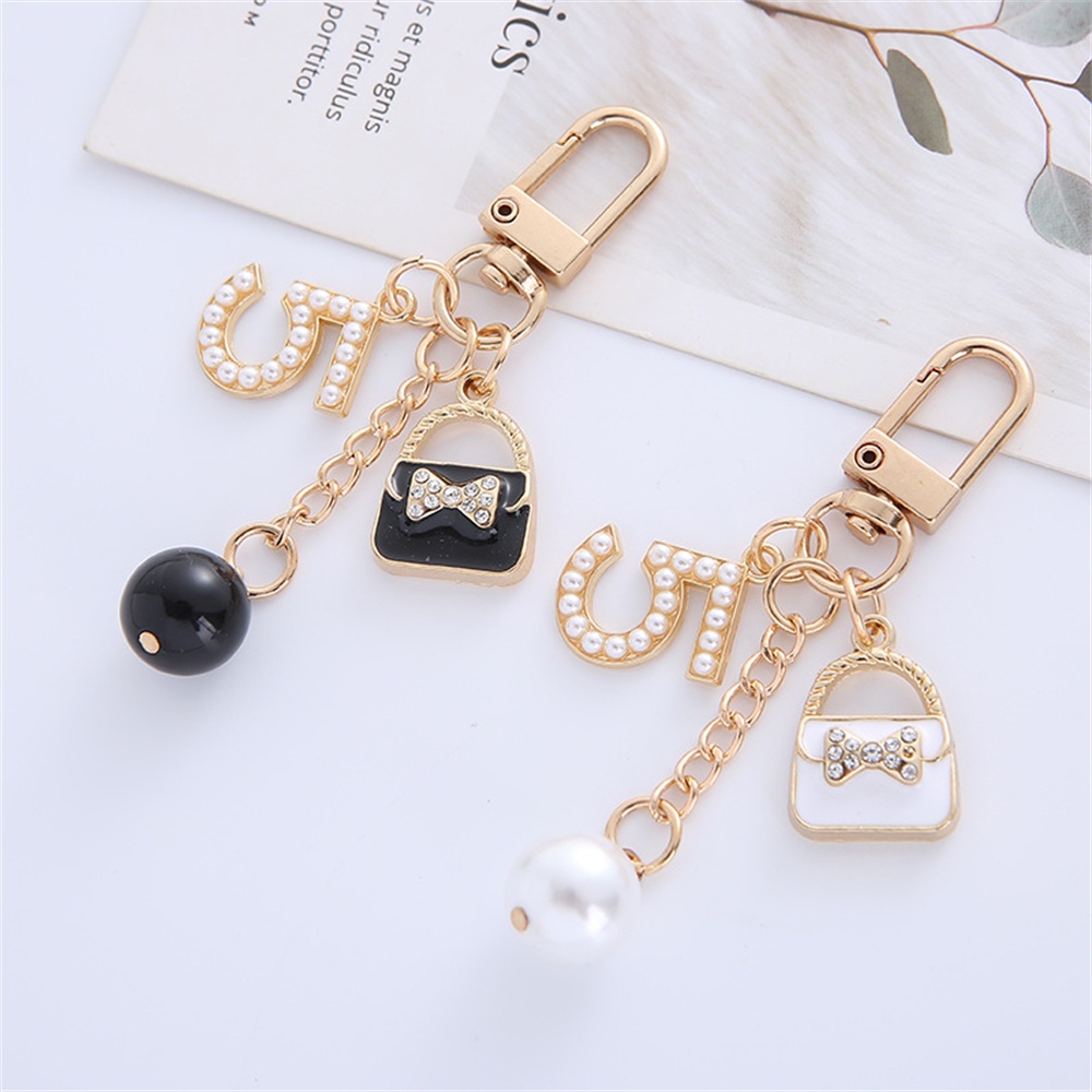 Mới Móc Khóa Kim Loại Hình Túi Xách Đính 5 Hạt Ngọc Trai Sáng Tạo