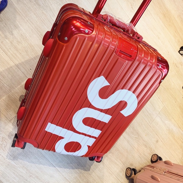 Va li khung nhôm khoá cài treo túi