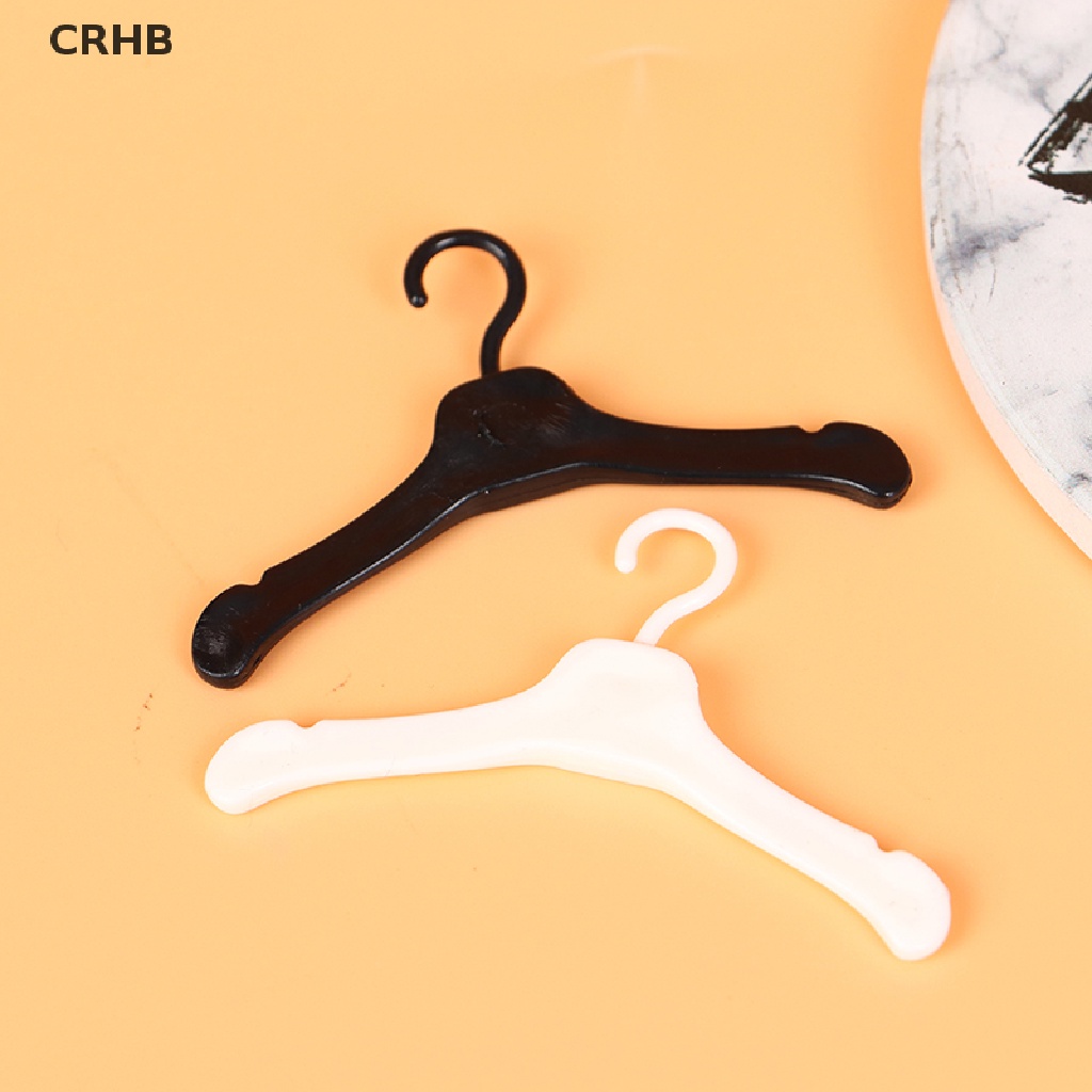 Bộ 10 Móc Treo Quần Áo Mini Bằng Nhựa Đáng Yêu Mới