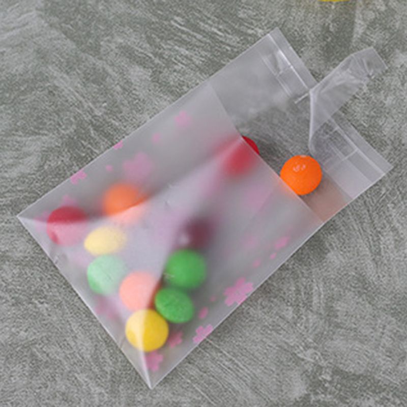 Set 100 túi nhựa đựng bánh kẹo in hình hoa anh đào với 3 kích cỡ