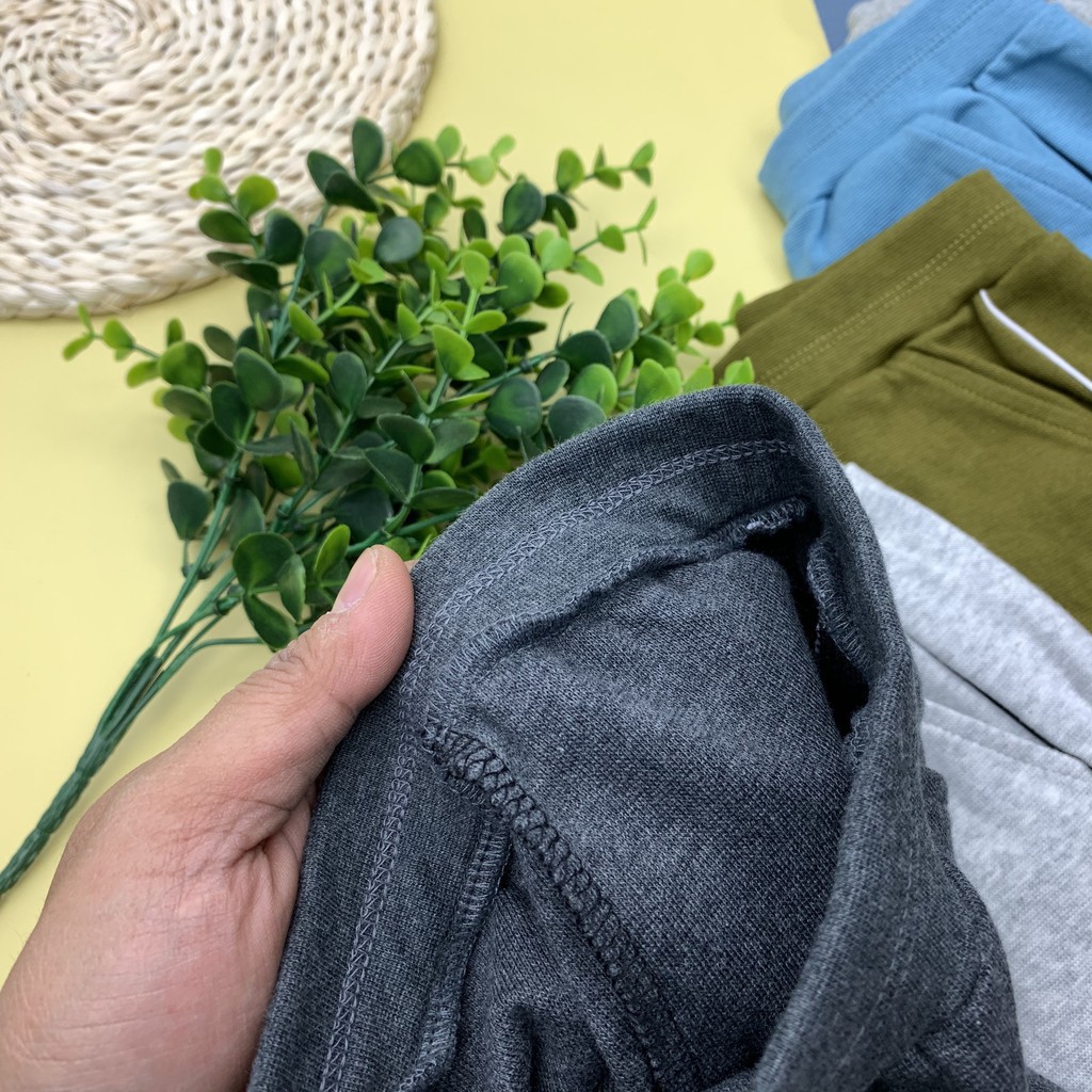 Quần nỉ bông bo gấu, có túi in chữ CP bé trai size 9-14T, cho bạn từ 26-41kg. Chất nỉ bông siêu ấm, dày dặn, đanh tay