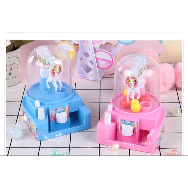 Máy gắp kẹo có kẹo thật bên trong, chơi giống máy thú bông, cỡ 13cm, có clip.
