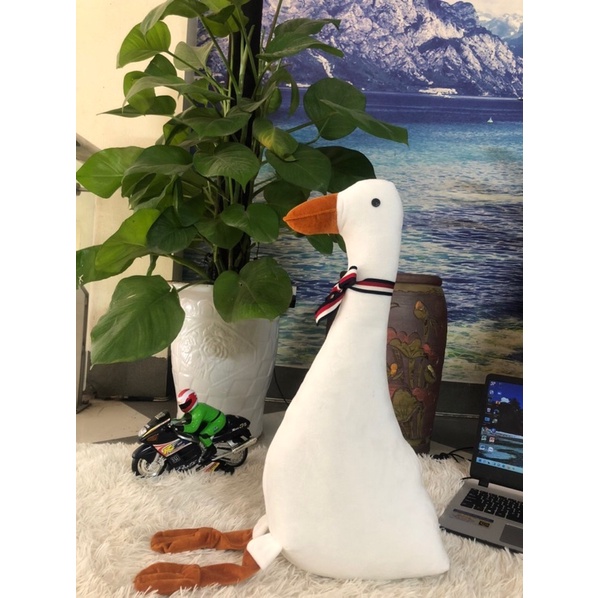 Gấu bông gối ôm hình con vịt dài 65cm cute đáng yêu co dãn 4 chiều