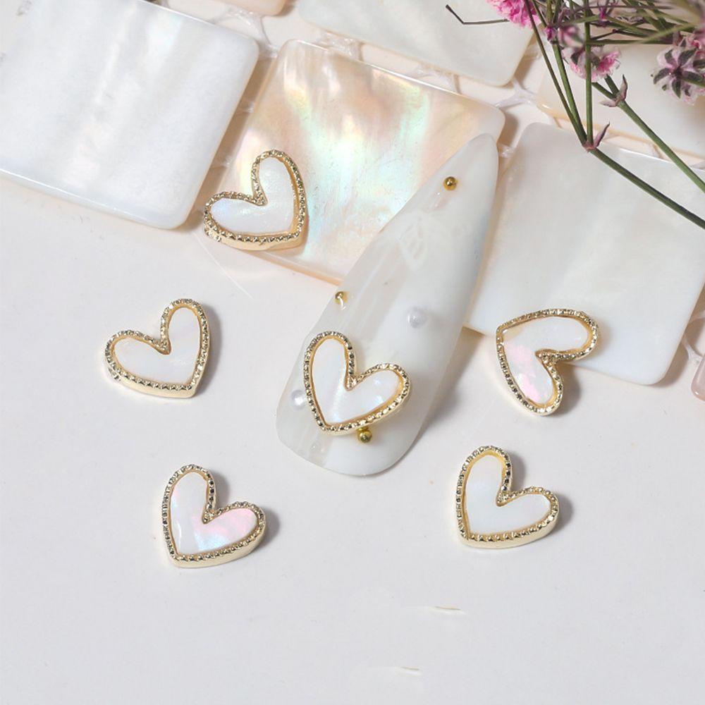 Set 10 Phụ Kiện Trang Trí Móng Tay 3D Bằng Hợp Kim Hình Trái Tim Thời Trang