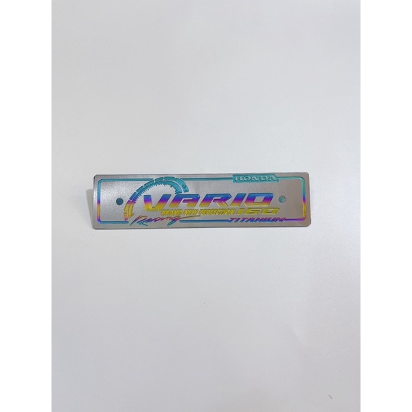 Bảng tên titan trước xe Vario 125/150/160 điện phân kèm ốc tán salaya hoặc gr5