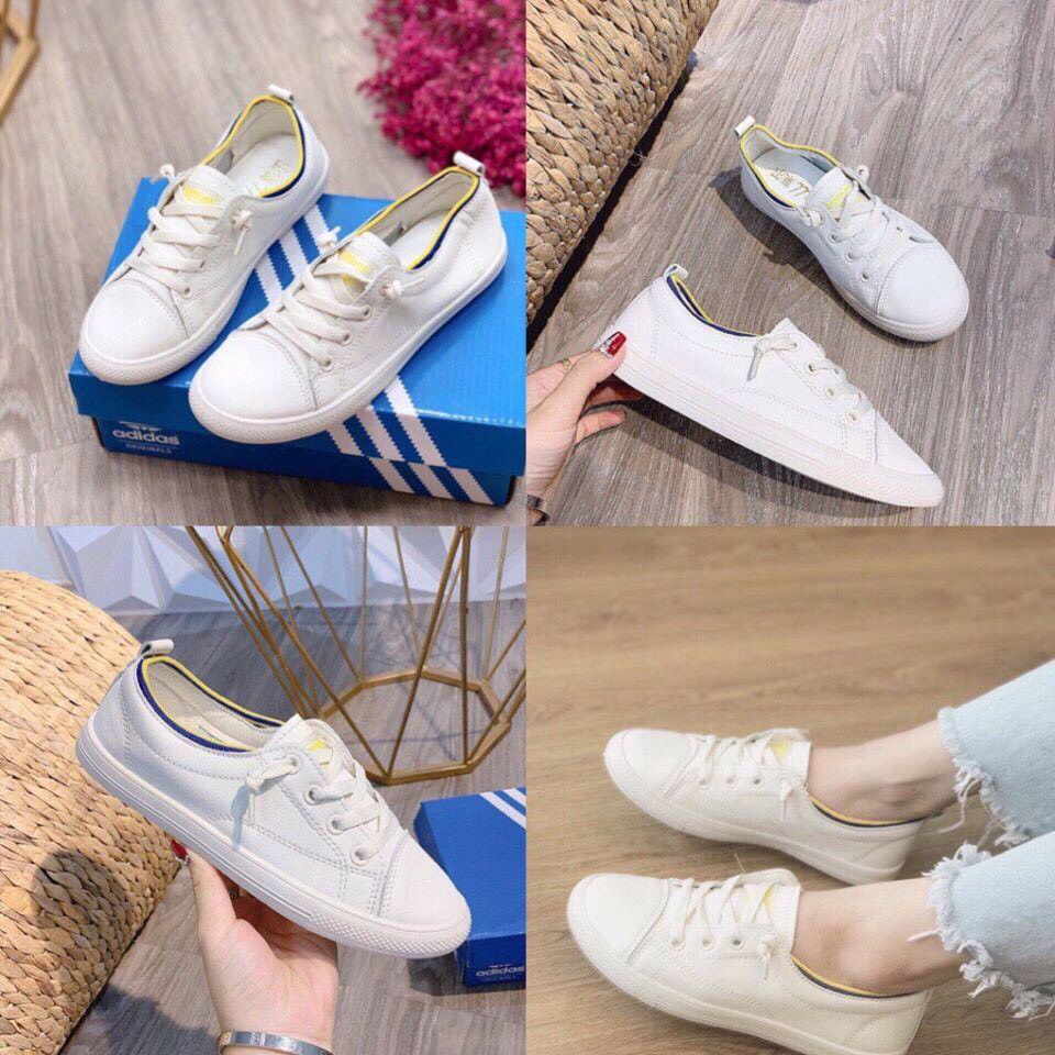 Giày thể thao nữ trắng viền vàng chất da mềm êm chân