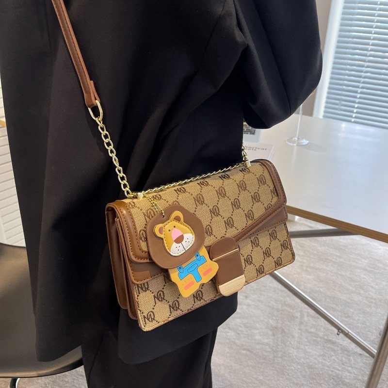 Túi MQ KÈM CHARM SƯ TỬ