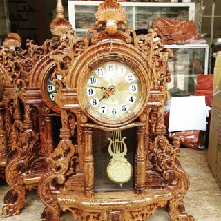 ĐỒNG HỒ GỖ MUN ĐUÔI CÔNG