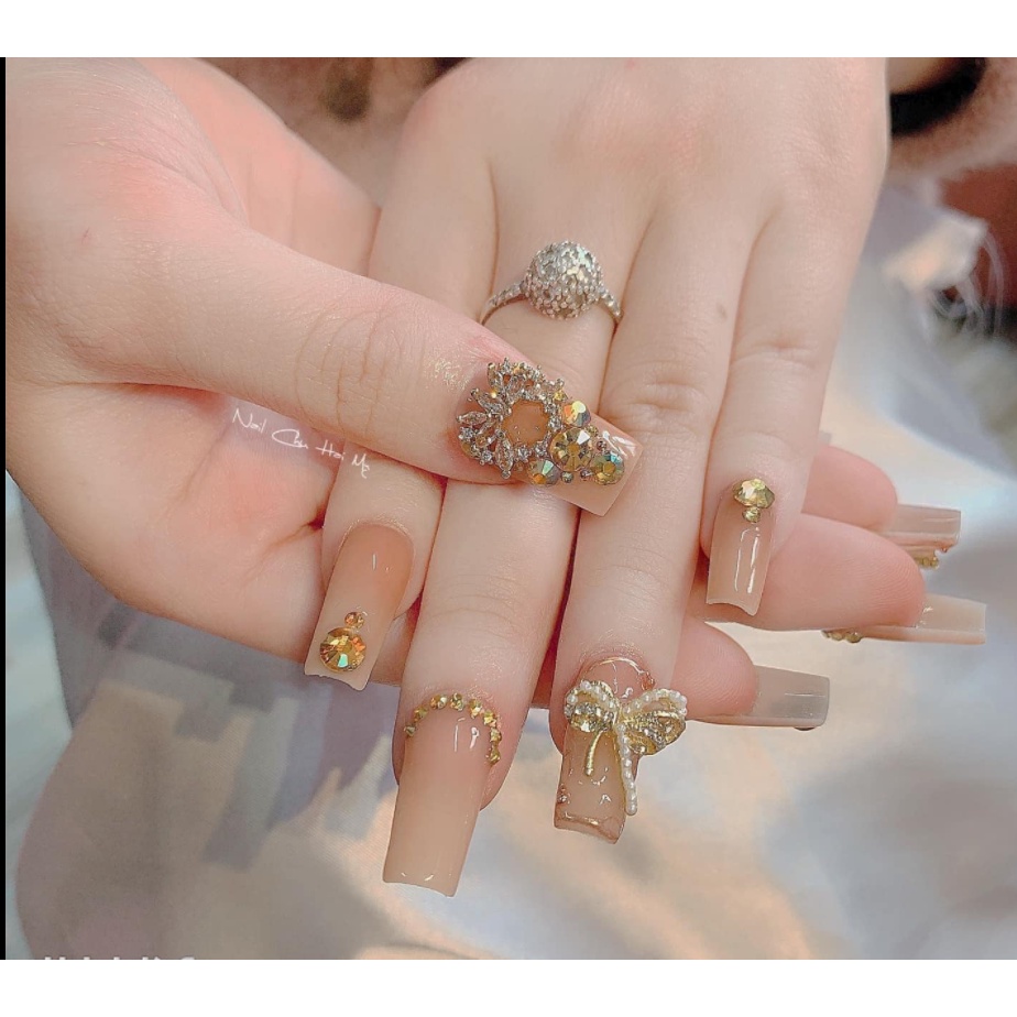 charm nơ kép vàng bạc