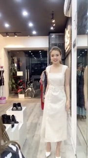 Váy nẹp lệch be nhạt cchat