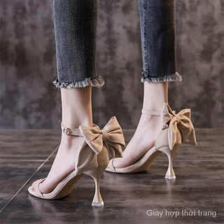 Horizontal strap high heels with a lovely bow bow