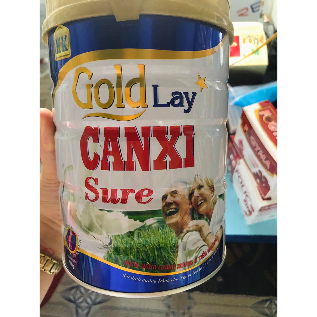 Sữa goldlay canxi sure 900g (date 2024) ngừa loãng xương cho người già