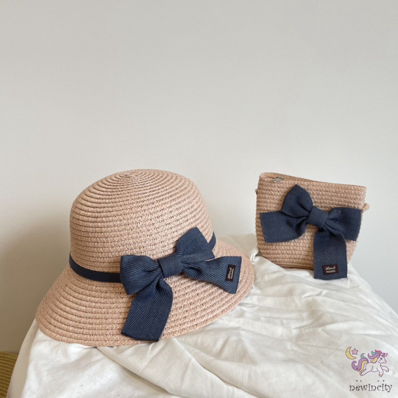 Set mũ vành và túi xách đan cói đính nơ thời trang mùa hè đáng yêu cho bé gái