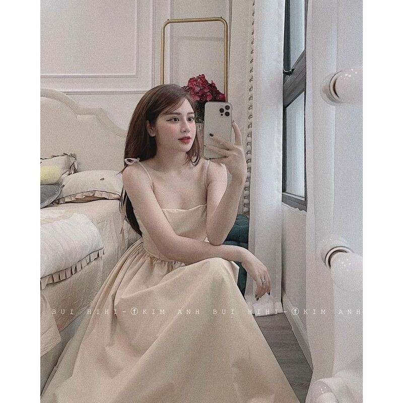 Váy 2 dây đũi mỏng buộc dây vai dang xòe