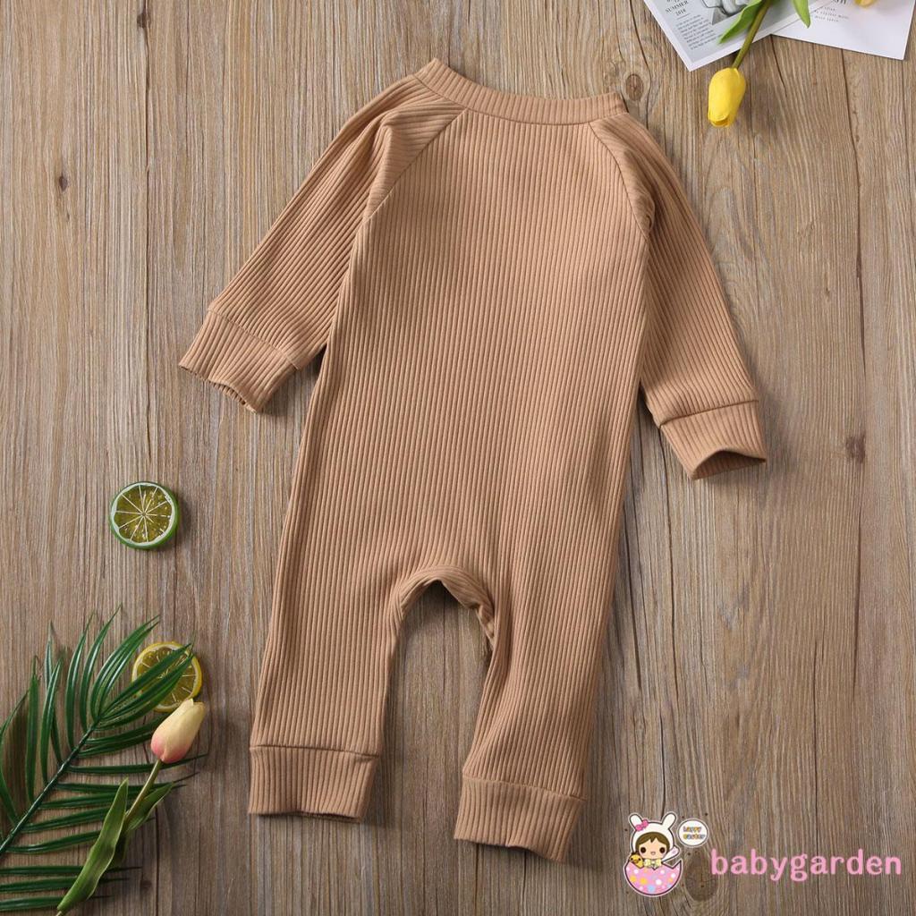 Bộ áo liền quần cổ tròn tay dài màu trơn cài nút phối khóa kéo thời trang cho bé