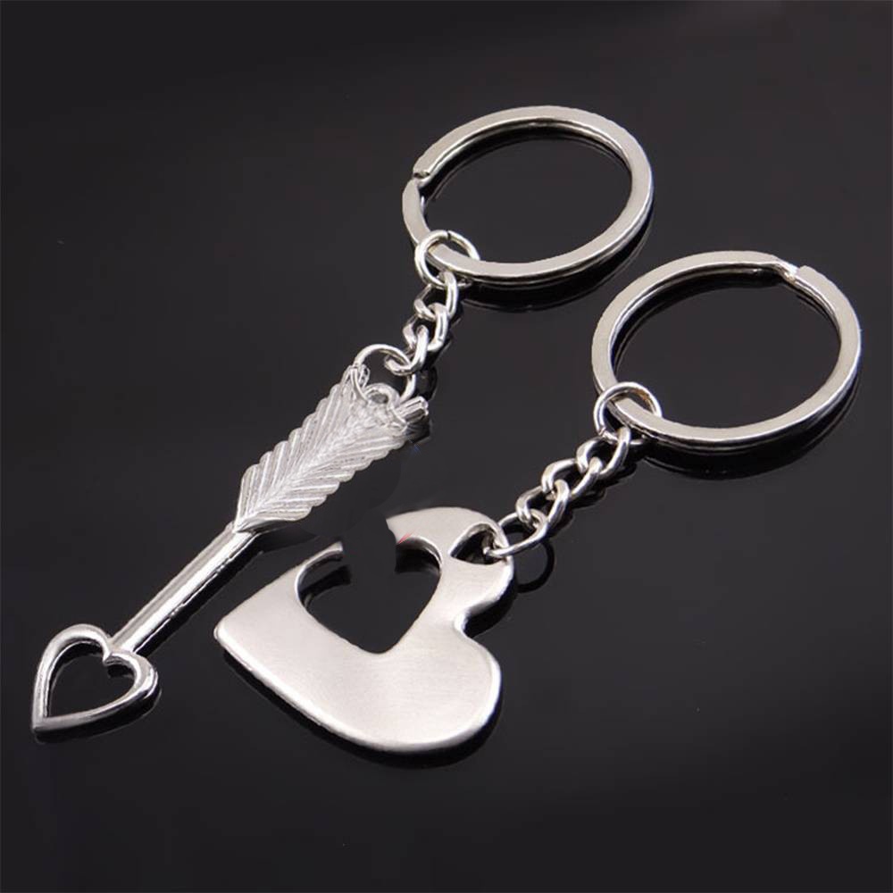 Set 2 móc khóa đôi inox ghép hình trái tim và mũi tên lãng mạn