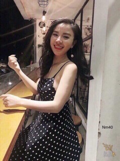 Đầm chấm bi hở lưng đan dây [Ảnh thật