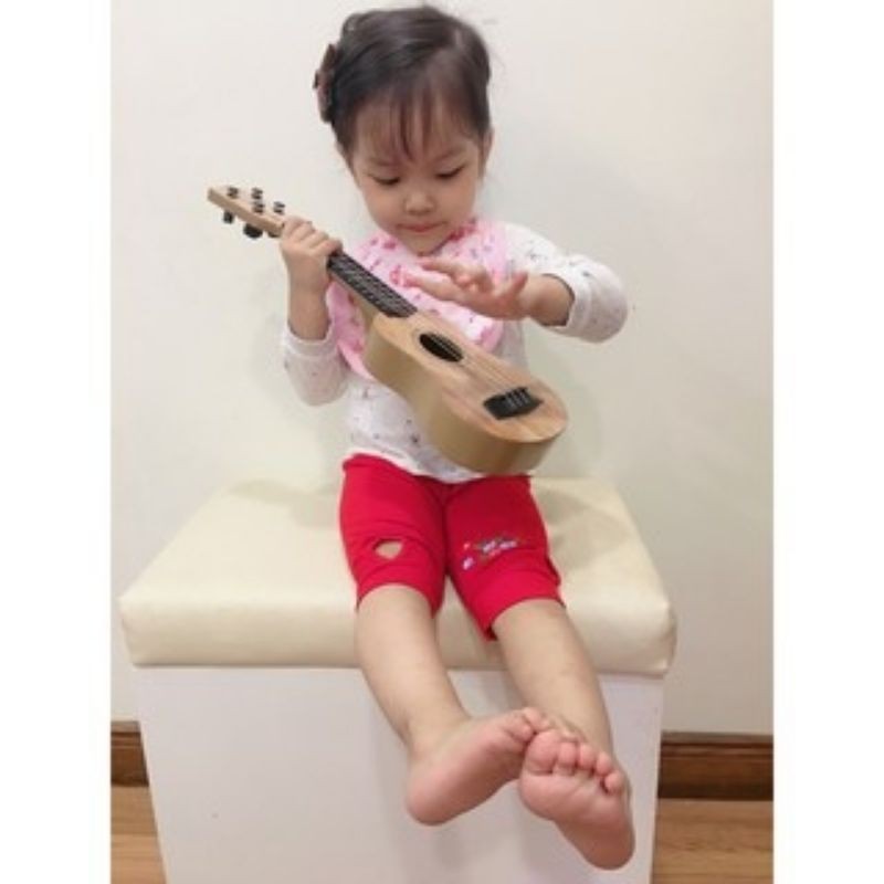 Đồ chơi đàn Ghi ta mini Đàn ukulele nhựa cho bé