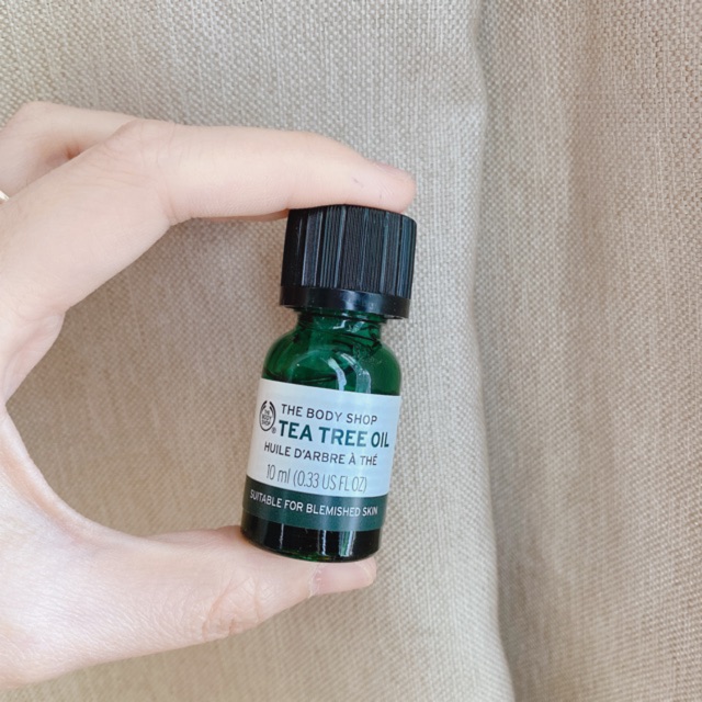 Tinh dầu trà dành cho da mụn tea tree oil The Body Shop