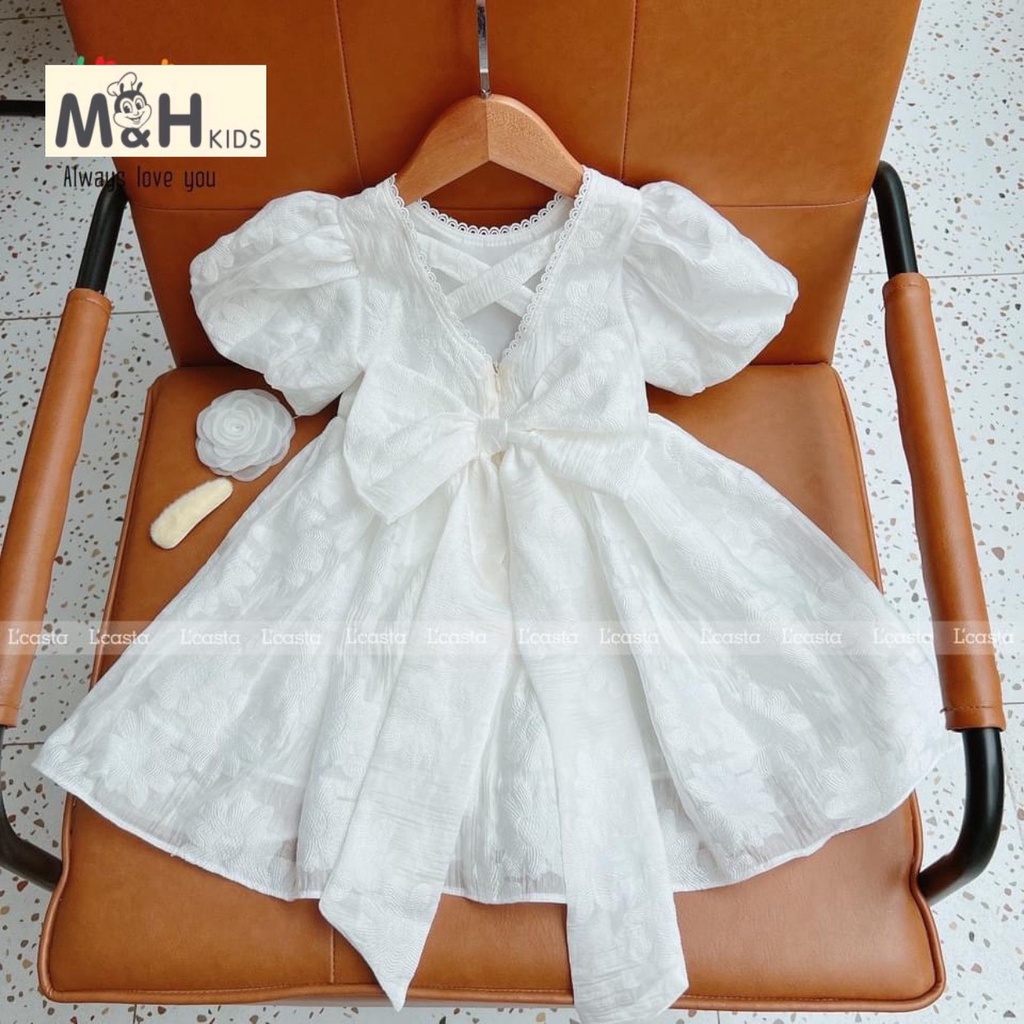 Váy trắng công chúa tay bồng cho bé 10-25kg. Chất liệu gấm hoa cao cấp, lớp lót lụa siêu mát, gắn nơ sau lưng siêu xinh