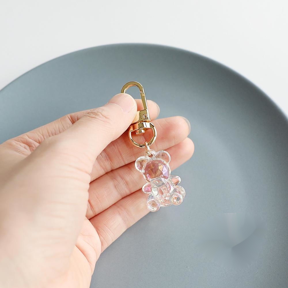 Móc Khóa Gắn Vỏ Bảo Vệ Hộp Sạc Tai Nghe Airpods Trong Suốt Hình Gấu Dễ Thương