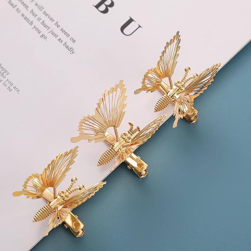Set 2 kẹp tóc HAIMEIKANG kim loại hình bướm phối tua rua thời trang Hàn Quốc cho nữ