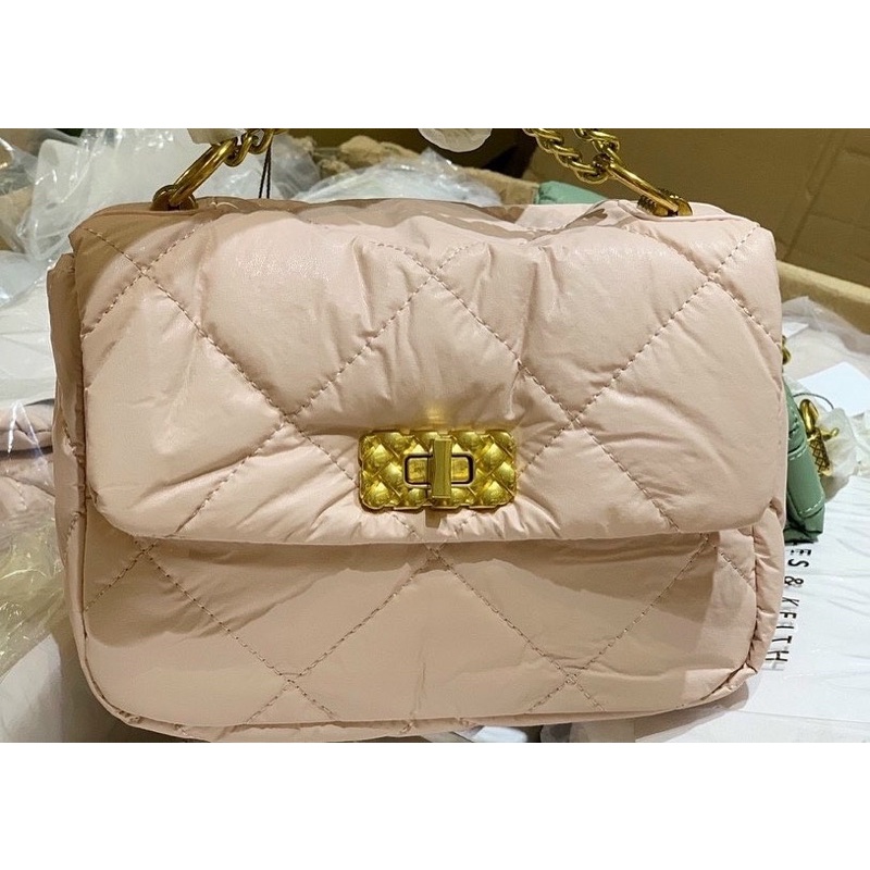 Túi ô trần khoá xoay chất da mới