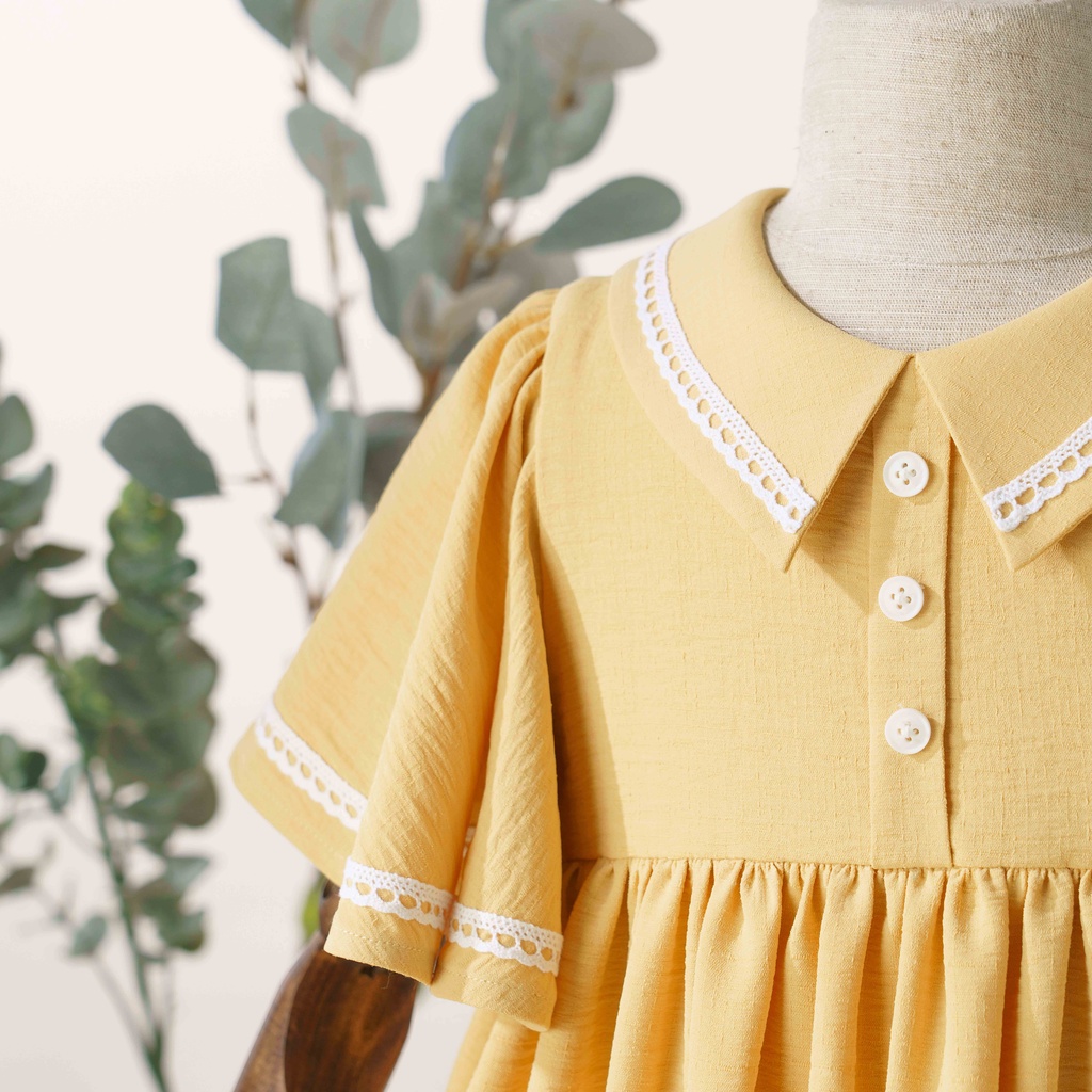 Váy Bé Gái Thiết Kế Nora Màu Vàng Nắng, Tay Áo Cánh Tiên Viền Ren BEBAE KIDSWEAR