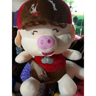 Heo đội nón nhồi bông