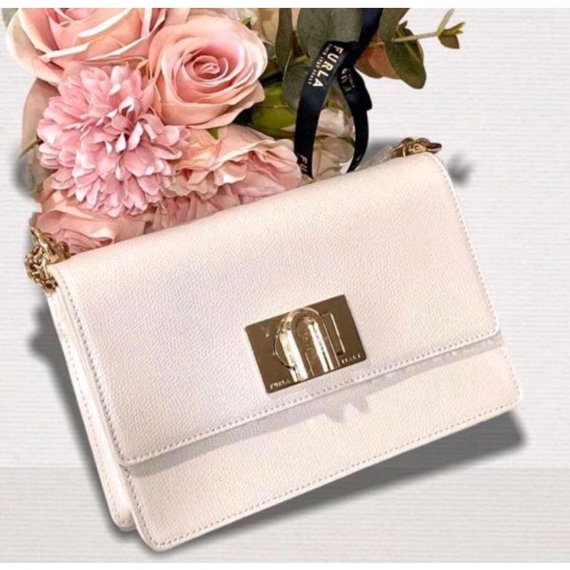 MIẾNG DÁN KHÓA TÚI  FURLA 1927