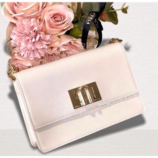 Miếng dán khóa túi furla 1927