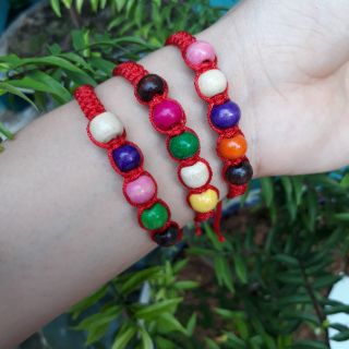 Vòng chỉ đỏ mix hạt gỗ đủ màu