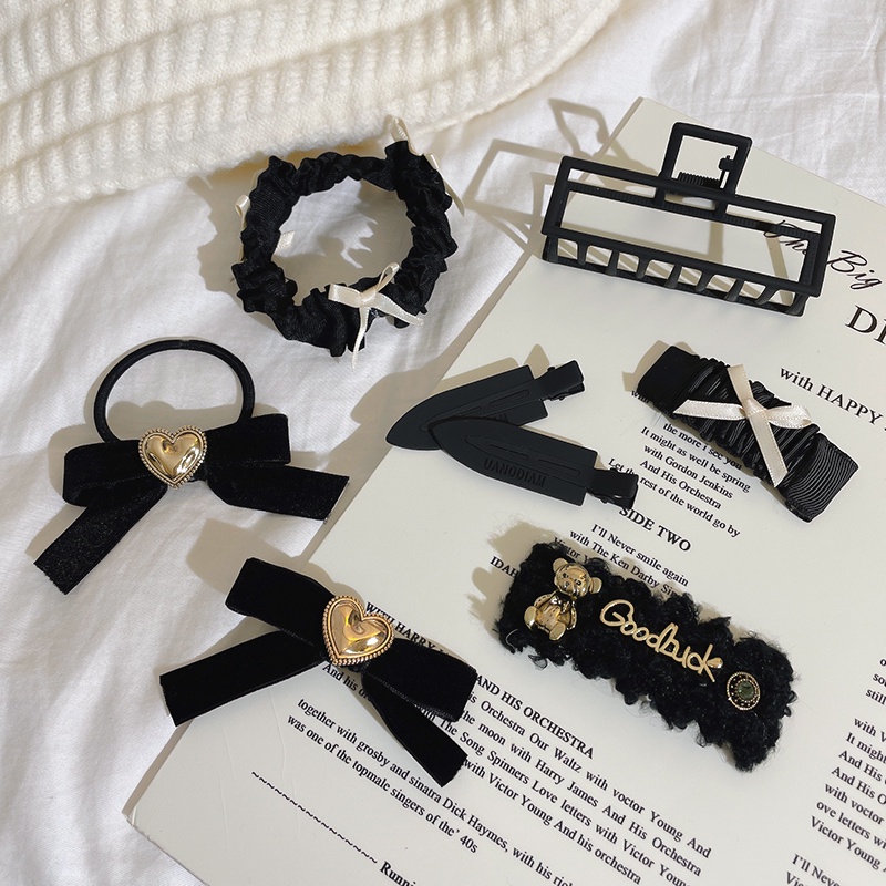 Dây cột tóc màu đen phong cách Hàn Quốc dễ phối đồ