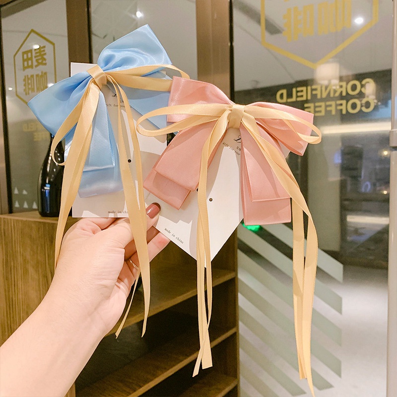 Kẹp tóc nơ nữ tính đơn giản và dễ thương