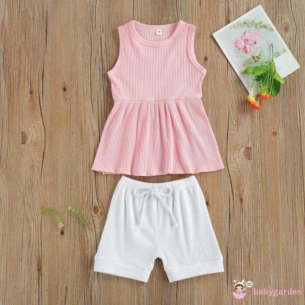 Bộ áo không tay cổ tròn và quần short bằng vải thun gân cho bé gái từ 2-7t