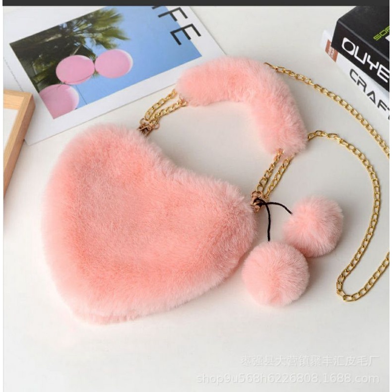 Túi xách lông phối tua rua