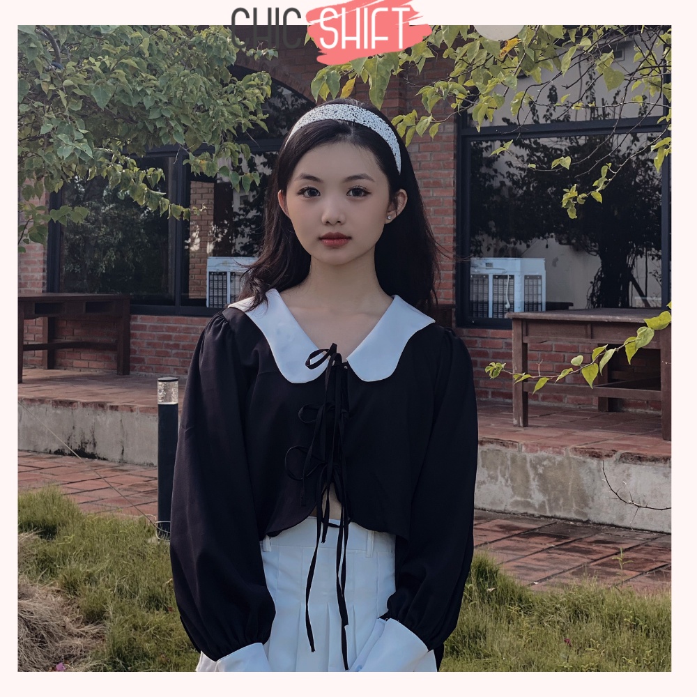 Áo sơmi nữ dài tay cột nơ cách điệu màu đen và trắng vạt áo lượn sóng mặc đi học, đi chơi - Chicshift