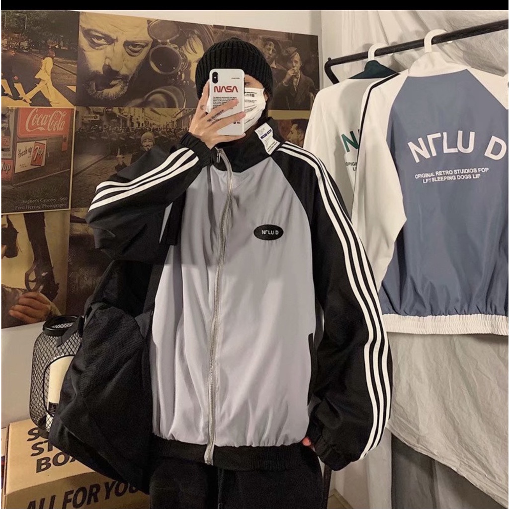 Áo khoác gió form rộng cổ cao, áo vải dù jacket 2 lớp unisex nam nữ họa tiết UnF chất đẹp giá xưởng Moonunisex