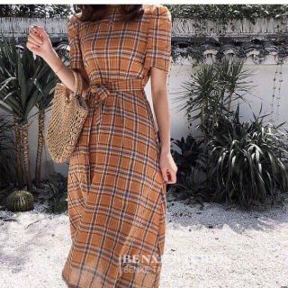 Đầm caro nâu cột nơ eo