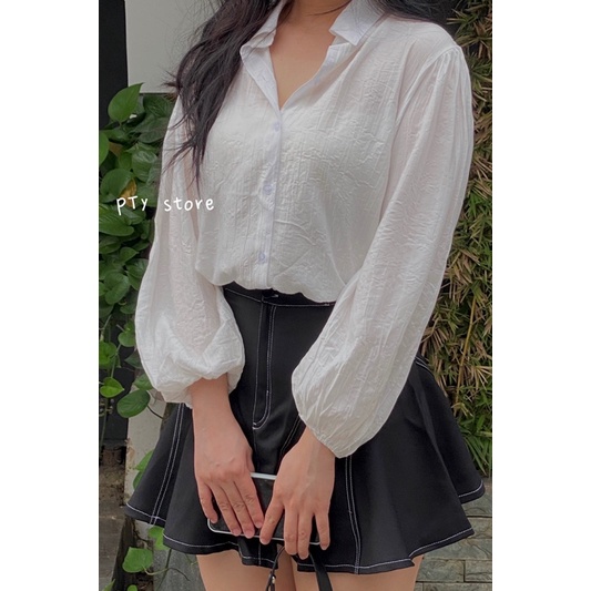 Set áo sơ mi trắng tay bồng chân váy đen viền xoè PTYS