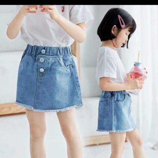 Váy bò 3 cúc cho bé