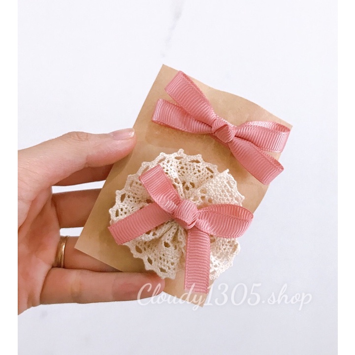 Set kẹt nơ và hoa màu hồng xinh xắn